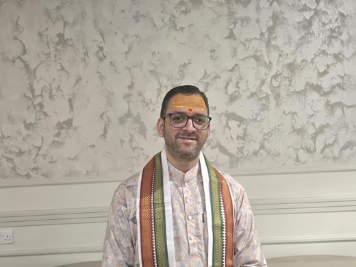 Hindu priest Deepak Thapliyal leading prayers in Abu Dhabi