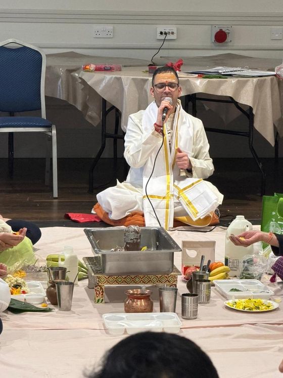 Pandit performing a havan fire ritual